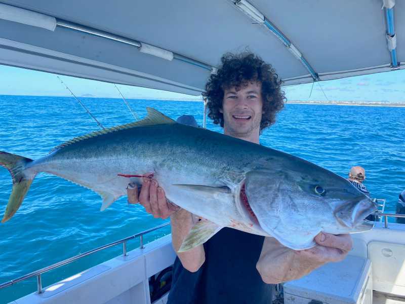 Noosa Fishing Adventures Skipper - Lachie catches first fish of the day, a big Kingfish!